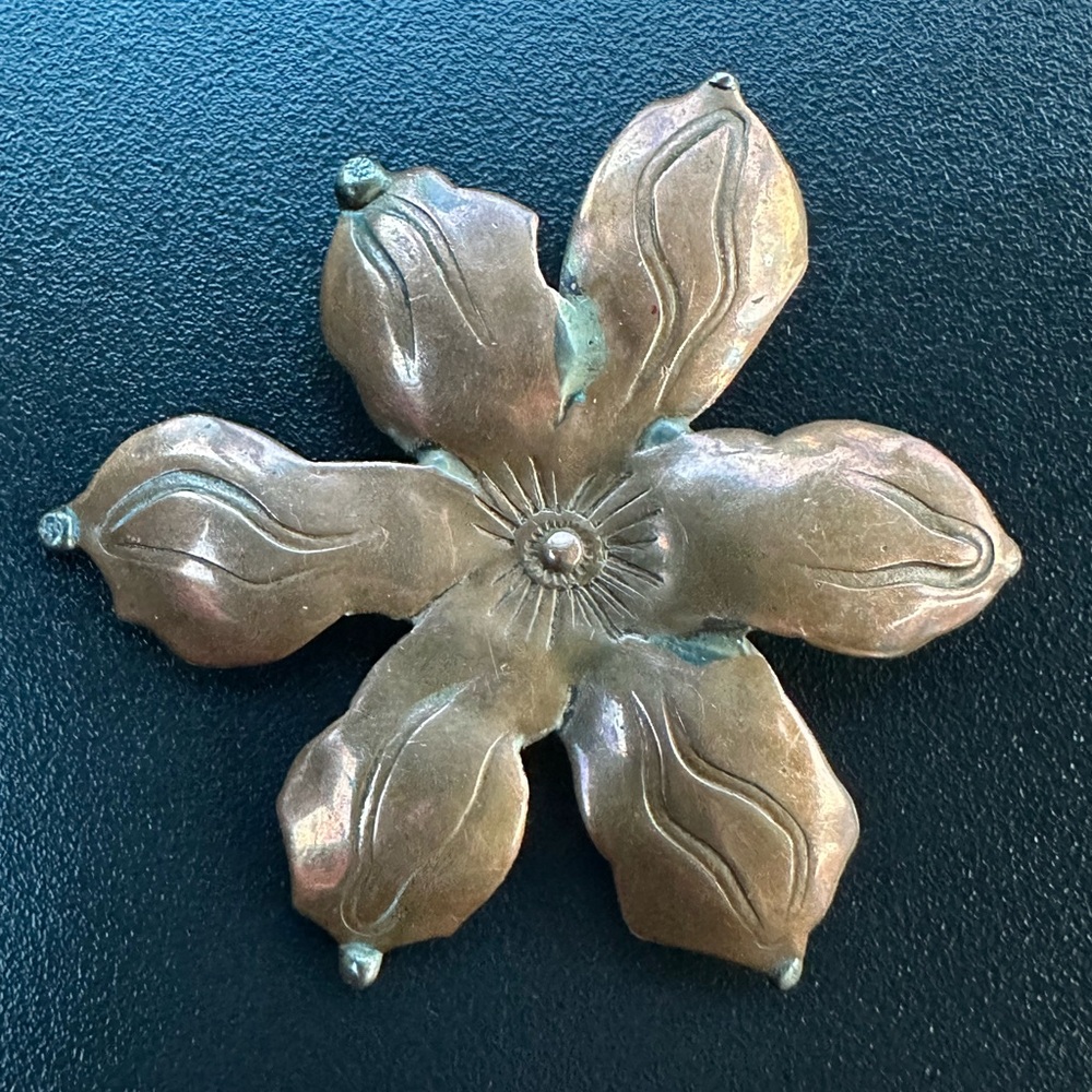 Vintage handcrafted copper magnolia flower brooch.